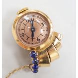 A lady's 1930's/1940's yellow metal and blue cabochon set lapel clip watch, 25mm, gross weight 9.5