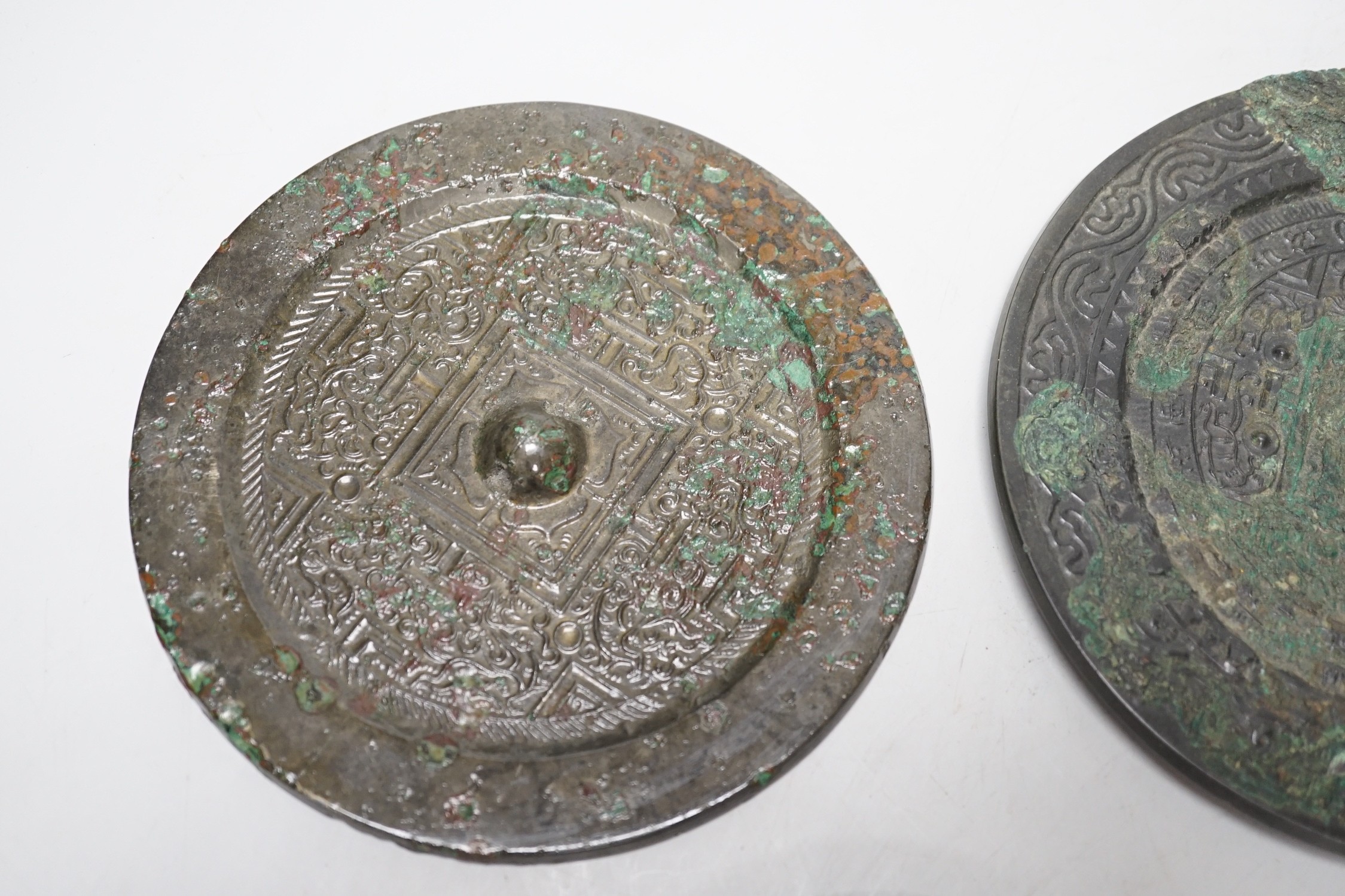 A group of six Chinese archaic bronze mirrors, including two Han dynasty TLV mirrors, and a Tang - Image 2 of 2