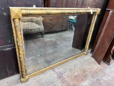 A Victorian gilt gesso and carved wood wall mirror, with vineous scroll borders, width 141cm, height
