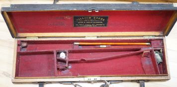 A Victorian brass bound gun case, stamped P-E-B-S. 80cms high, 24cms deep
