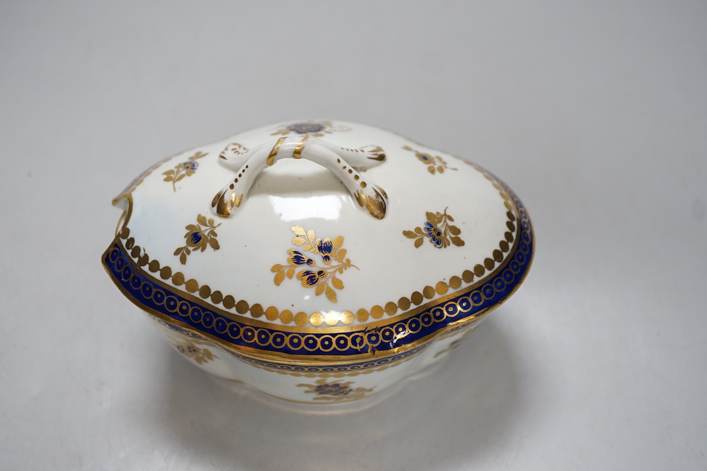 An 18th century Caughley tureen cover and stand with blue and gilt decoration, stand mis-fired to - Image 2 of 2