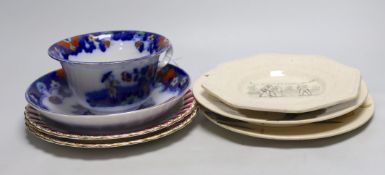 A pair of Doulton plates, a pair of floral plates, a Victorian nursery plate and a large flow blue