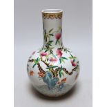 A small Chinese peach decorated bottle vase, 23cm high