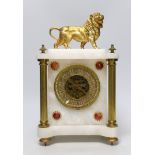 A French alabaster and gilt metal lion and ceramic mounted mantel clock, 34cm high