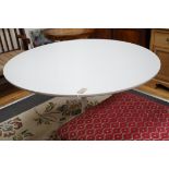 A mid century melamine topped ‘Tulip’ design dining table, diameter 121cm *Please note the sale