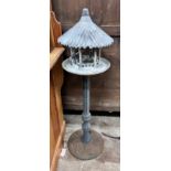 A cast iron and galvanised metal garden lantern / bird table, height 110cm *Please note the sale