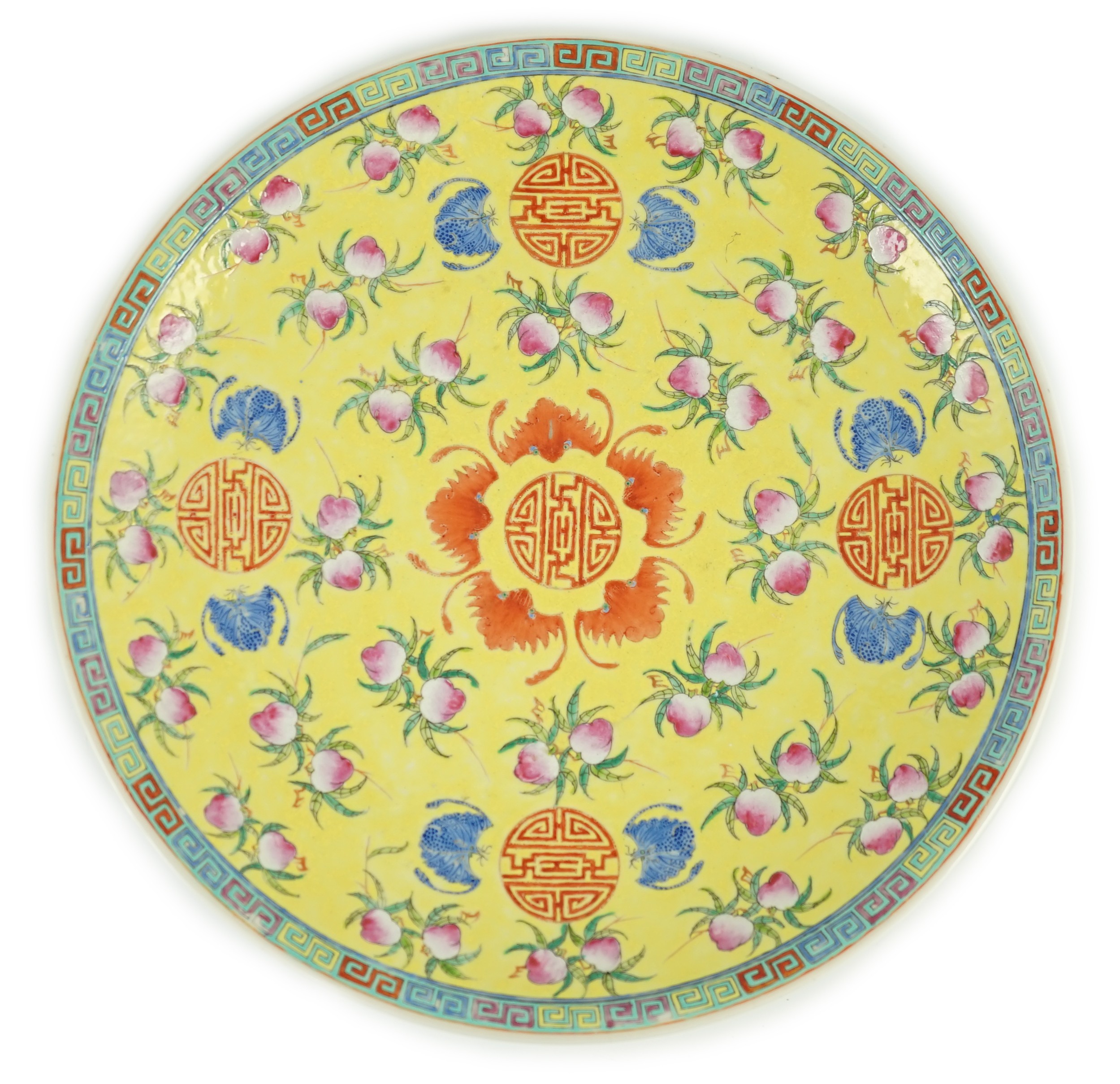 A Chinese yellow ground ‘peaches and bats’ dish, Republic period, enamelled with Shou medallions,