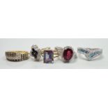 Five assorted modern 9ct gold and gem set rings, including a white gold, deep pink tourmaline and