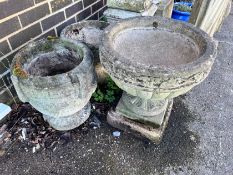 Three circular reconstituted stone garden planters, largest diameter 46cm, height 49cm *Please