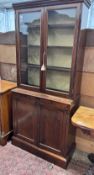 A Victorian pine bookcase cupboard, width 86cm, depth 35cm, height 190cm *Please note the sale