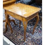 A 19th century Continental walnut and parquetry occasional table, width 59cm *Please note the sale