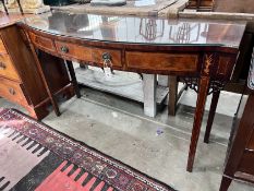 A George III inlaid mahogany bow front serving table, length 140cm, depth 47cm, height 84cm *