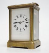 A striking carriage clock, 12cm tall