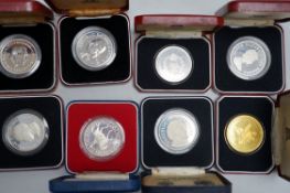 Eight Royal Mint proof silver crowns and six Pobjoy Mint silver crowns