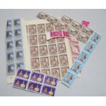 A group of World stamps in pockets including Malaya sheets