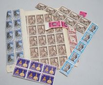 A group of World stamps in pockets including Malaya sheets