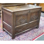 An early 18th century panelled oak coffer, width 96cm *Please note the sale commences at 9am.
