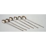 A set of six Chinese sterling cocktail straw spoons, 19.4 cm.