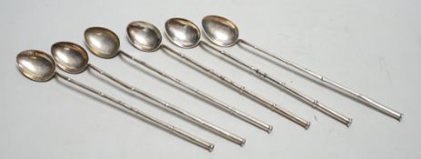 A set of six Chinese sterling cocktail straw spoons, 19.4 cm.