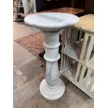 A circular marble pedestal, diameter 35cm, height 80cm *Please note the sale commences at 9am.