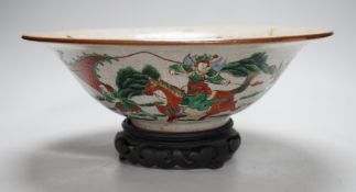 A Chinese famille verte crackle glaze ‘Eight Immortals’ bowl, early 20th century, 29cm diameter,