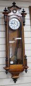A late 19th century walnut and ebonised Vienna wall clock, height 118cm *Please note the sale