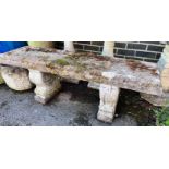 A reconstituted stone garden bench, length 128cm, depth 37cm, height 45cm *Please note the sale