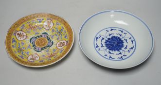 A Chinese blue and white dish and a similar enamelled dish, largest 20cm