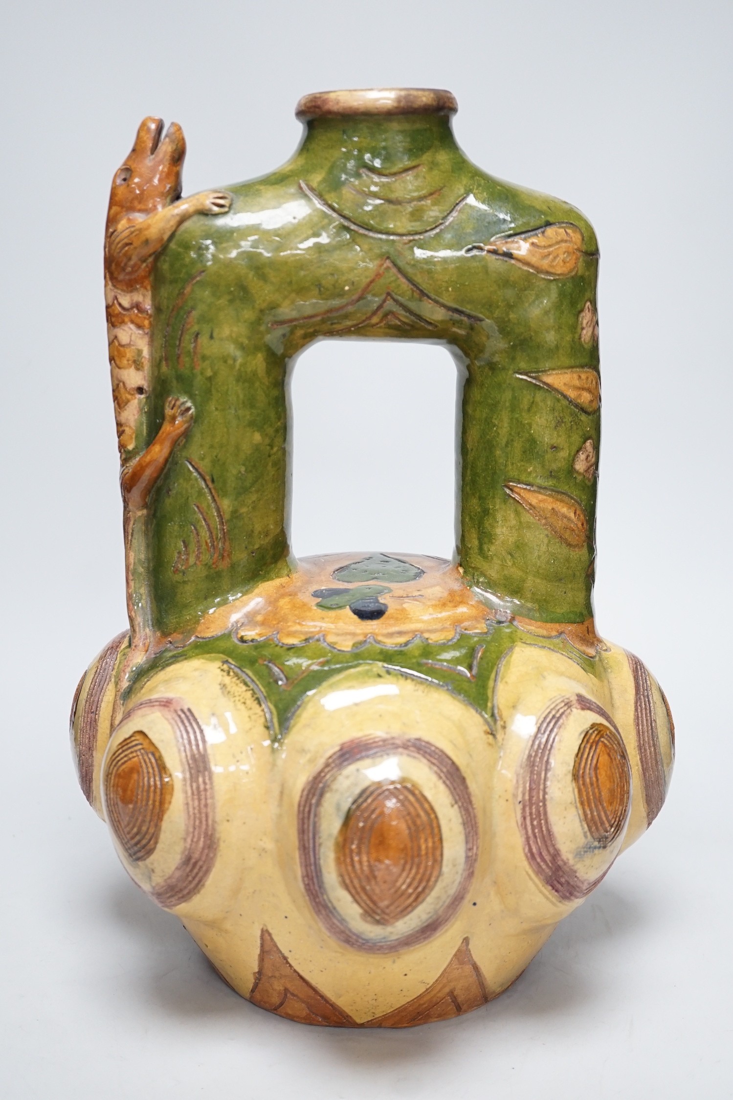 A Continental ‘lizard’ mounted pottery vase, 40cm