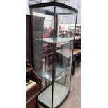 A late Victorian mahogany bowfront shop display cabinet, width 84cm, depth 58cm, height 196cm *