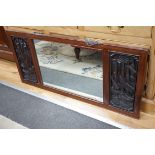 A Chinese hardwood relief carved wall mirror, width 114cm, height 53cm *Please note the sale