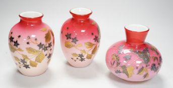 A pair of Stourbridge peach blow vases and another, tallest 13cm