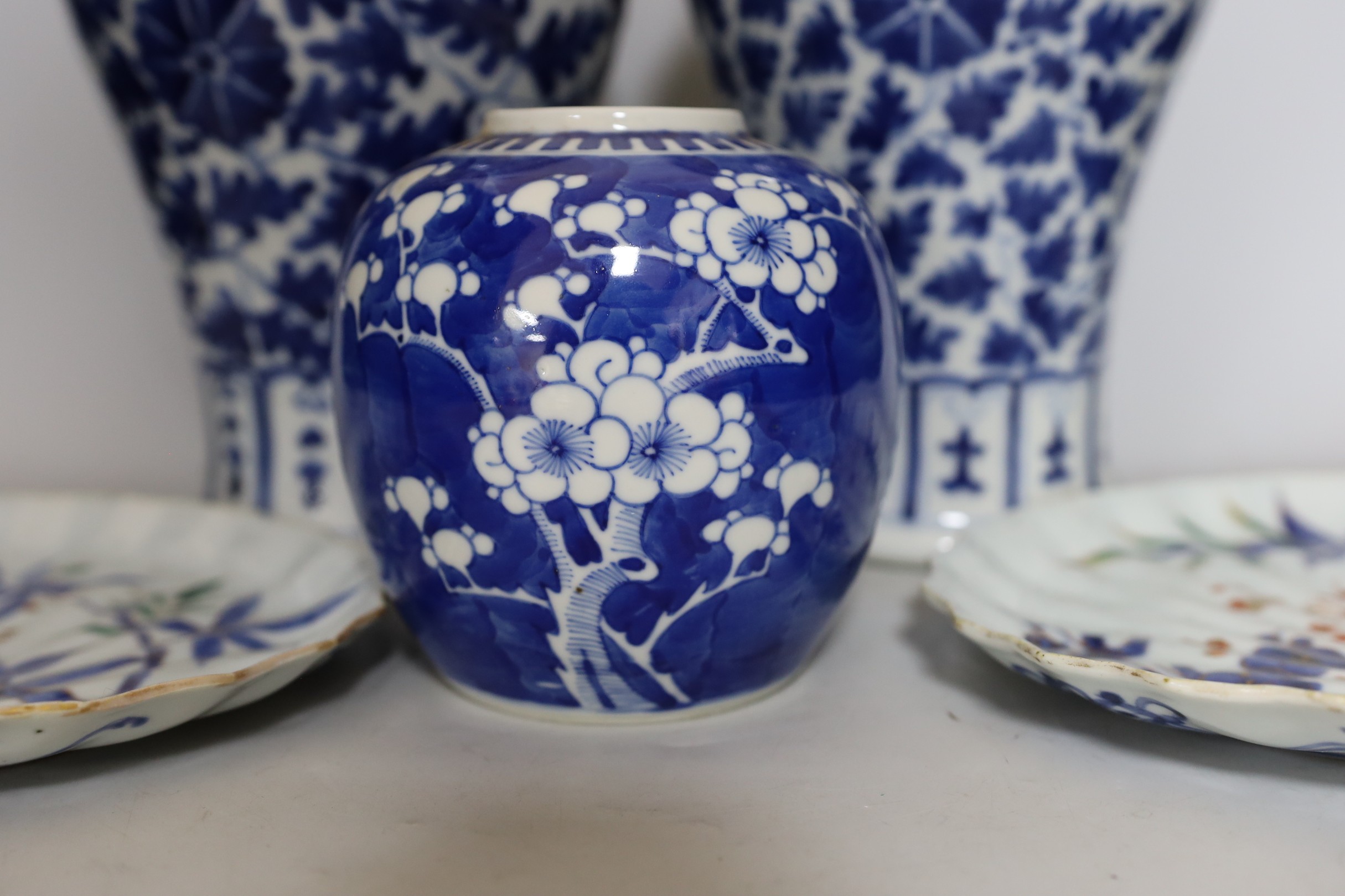 Two early 20th century Chinese blue and white vases with lion dog covers, together with a blue and - Image 2 of 2