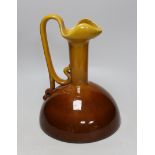 A Bretby ewer in the style of Christopher Dresser, base to top of handle, 31cm high