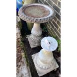 A circular reconstituted stone bird bath, diameter 50cm, height 62cm together with a faux marble