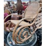 A caned bentwood rocking chair, width 52cm, height 88cm *Please note the sale commences at 9am.
