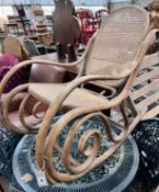 A caned bentwood rocking chair, width 52cm, height 88cm *Please note the sale commences at 9am.