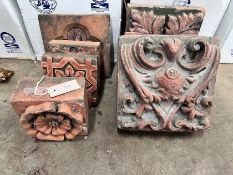 Seven assorted Victorian terracotta architectural decorative motifs, largest 25cm *Please note the