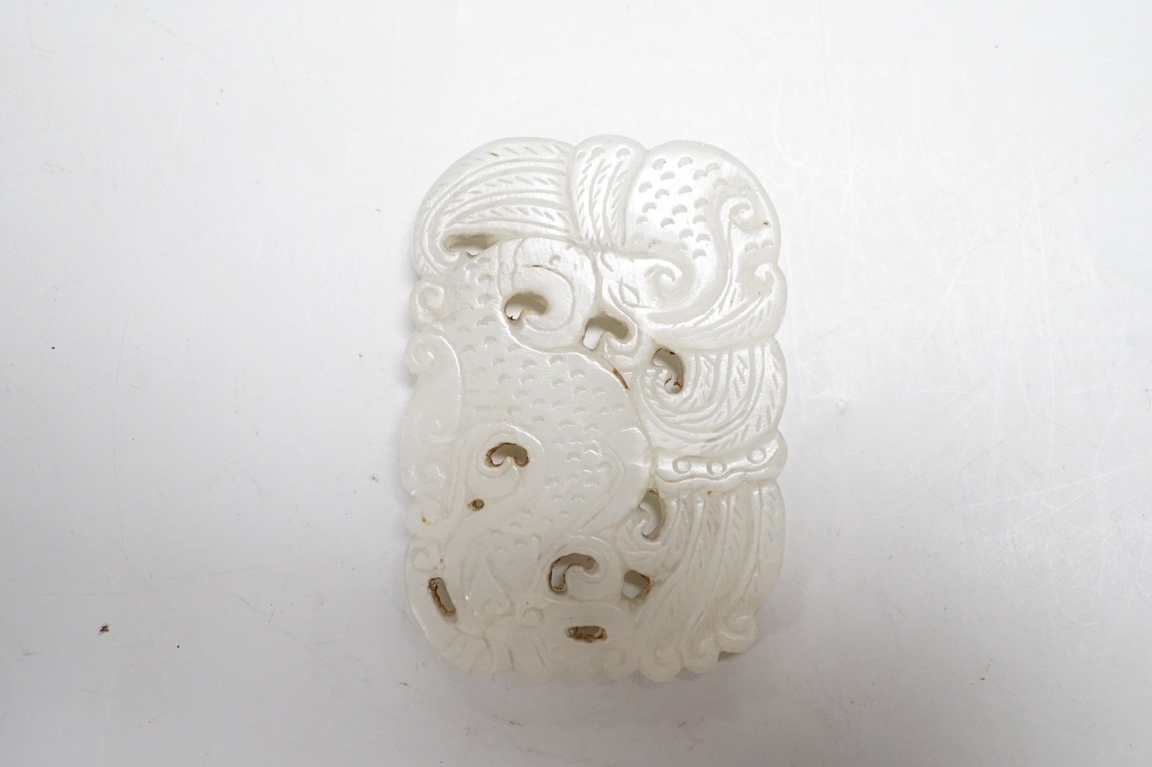 A Chinese white jade plaque, 19th / 20th century, 6 x 4cm - Image 2 of 2