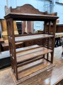 An Edwardian oak table top four tier open bookcase, width 62cm, depth 23cm, height 81cm *Please note