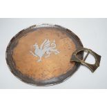 Paul Gillis. An Arts & Crafts copper tray and an Arts & Crafts buckle, tray 28cm diameter