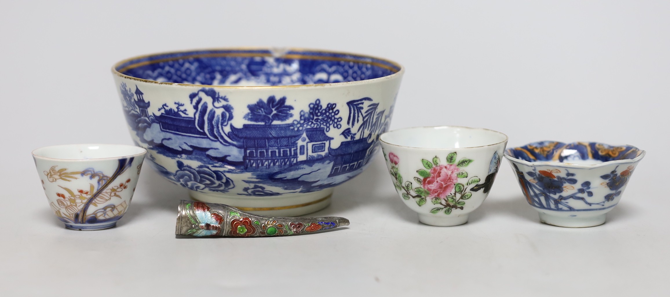 An English porcelain blue and white slop bowl, 15cm diameter, together with three miniature