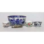 An English porcelain blue and white slop bowl, 15cm diameter, together with three miniature