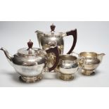 An Elizabeth II silver four piece tea set, with foliate border, A. E Jones Ltd, Birmingham, 1966,