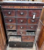A collector's chest (missing three drawers), width 70cm, depth 28cm, height 116cm *Please note the