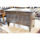 A 17th century style carved oak coffer, width 84cm *Please note the sale commences at 9am.