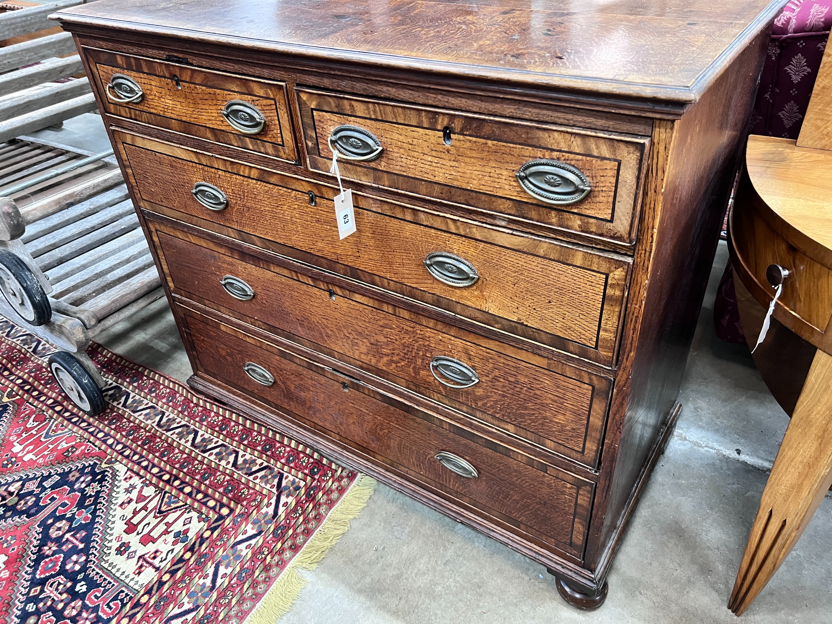 A George IV banded oak chest, width 112cm, depth 53cm, height 96cm *Please note the sale commences