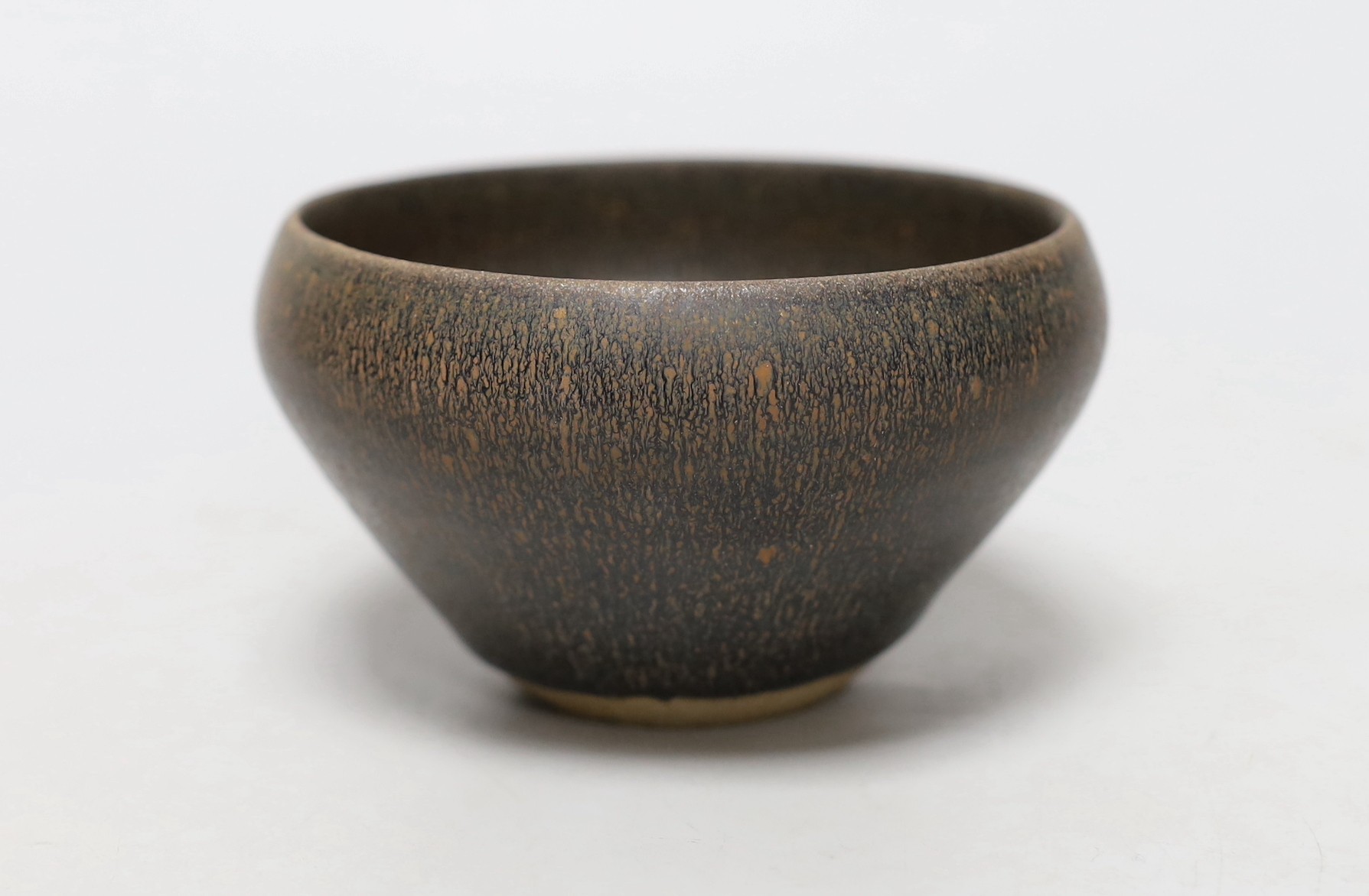 A Chinese brown pottery bowl, 11.5cms diameter