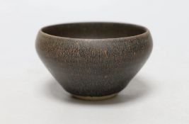 A Chinese brown pottery bowl, 11.5cms diameter