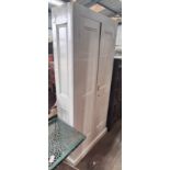 A white painted pine housekeeper's cupboard, width 99cm, height 210cm *Please note the sale